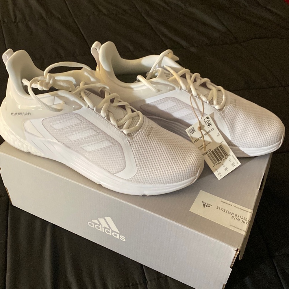White Adidas running shoes